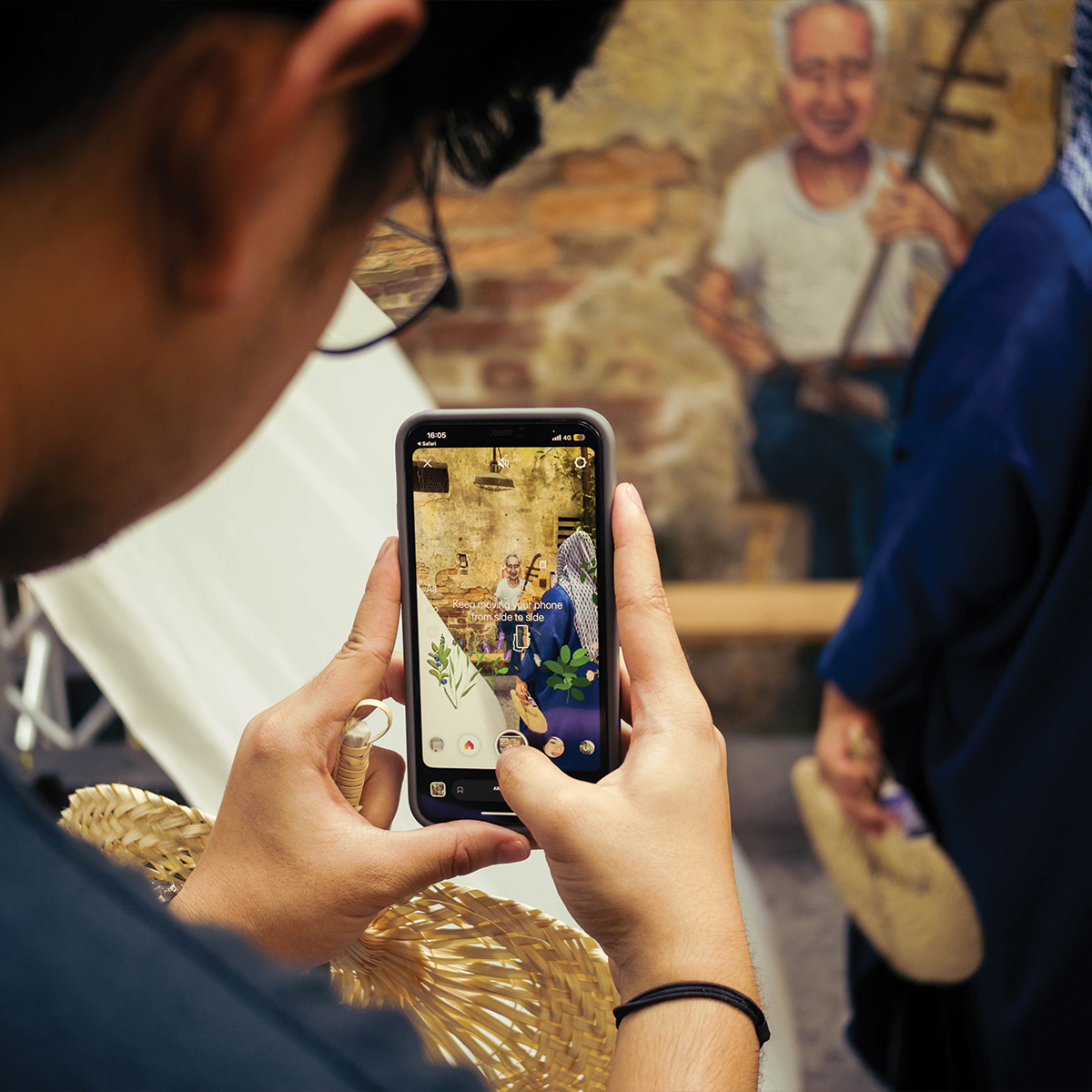 ARFestKL — festival attendees engaging with multiple AR artworks throughout the city centre
